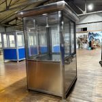 4×5 Stainless Steel Guard Shack, Swing Door, Curved Roof, With Legs and a Table — photo 5